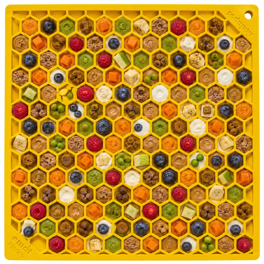 Yellow Honeycomb eMat filled with colorful foods and treats