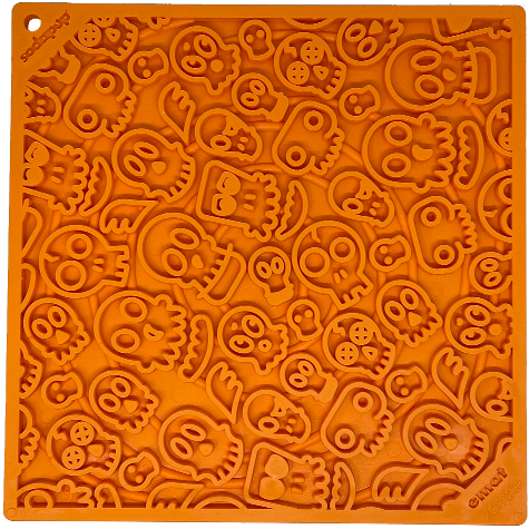 Orange SodaPup Zombie eMat lick mat with a skull and zombie pattern